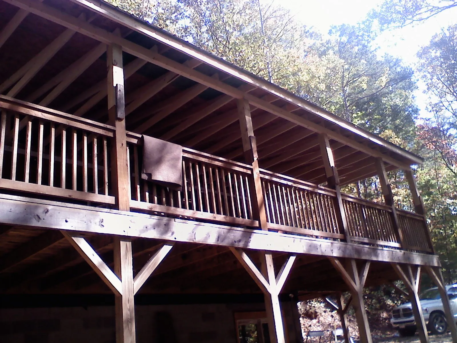 Timber framing under a new elevated porch and deck — Roof Leak Repair in Maumee by Roofing Brothers